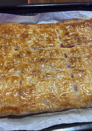 Una foto de Empanada Casera de Jamón, Bacon y Queso