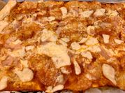 Una foto de pizza con masa hojaldre
