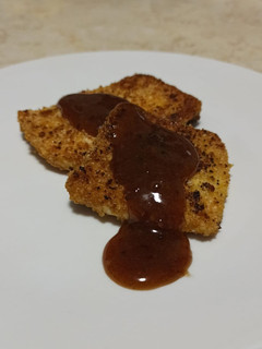 A picture of Cashew-crusted Paneer with Tamarind Sauce.