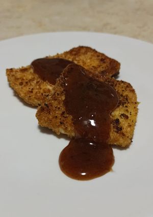 A picture of Cashew-crusted Paneer with Tamarind Sauce.