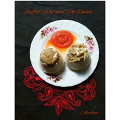 Stuffed Urad Dal Pot Dhokla A picture of Stuffed Urad Dal Pot Dhokla.