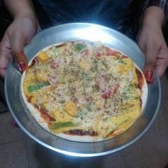 A picture of Paneer Pizza.