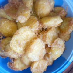 A picture of Fried potatoes with egg.