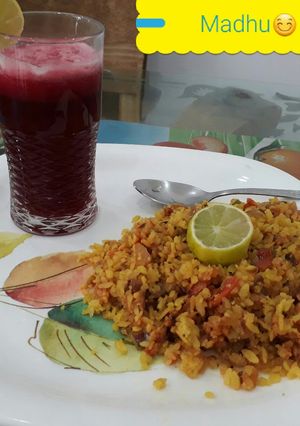 A picture of Tomato and Onion Poha with Energy booster Beetroot Tomato Ginger juice.