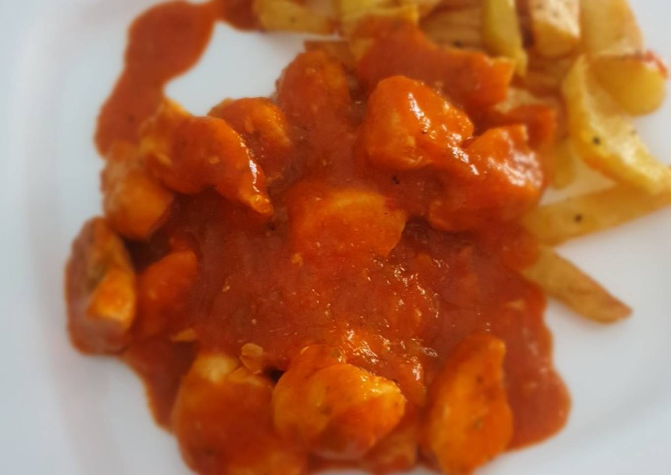 Pollo en salsa de tomate casera