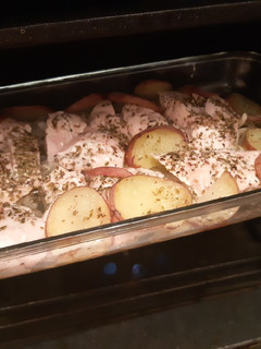 Una foto de Pollo al horno con papas