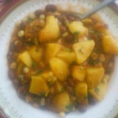 A picture of Githeri and potatoes.