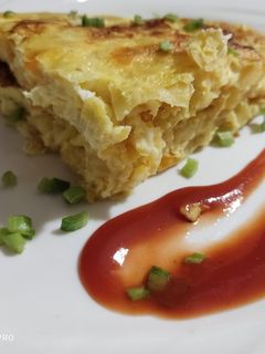 Una foto de Tortilla con papas y zanahoria