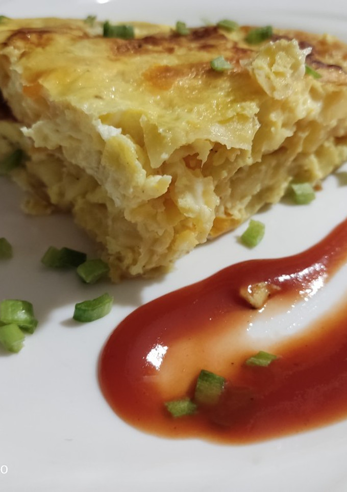 Una foto de Tortilla con papas y zanahoria