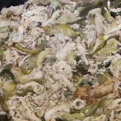 A picture of Pulled chicken with gherkin fettuccini.
