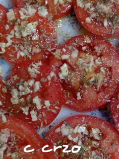 Una foto de Tomate al ajillo