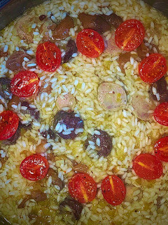Una foto de Arroz con butifarras y boletus