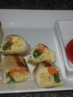 A picture of Bread roll sushi.