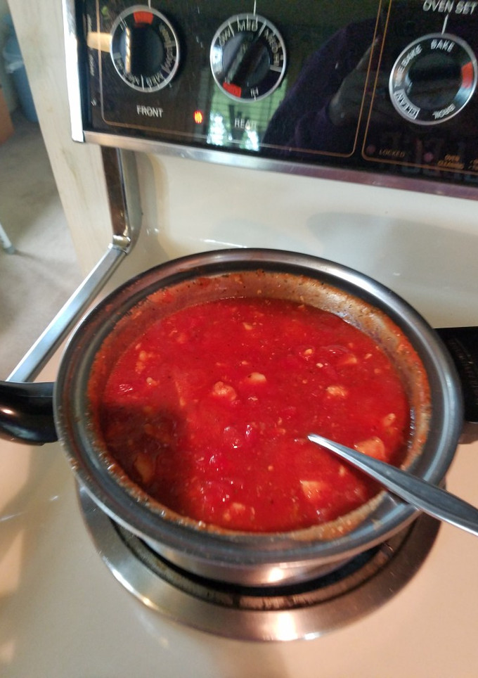 A picture of Chicken and macaroni with "homemade"tomato sauce.