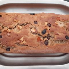 A picture of Whole wheat Banana oats bread with nuts n choco chips.