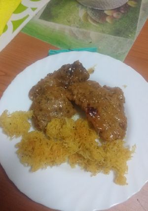 Foto principal de Solomillo de cerdo con salsa de cebolla y papas paja