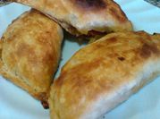 Una foto de empanada queso azul