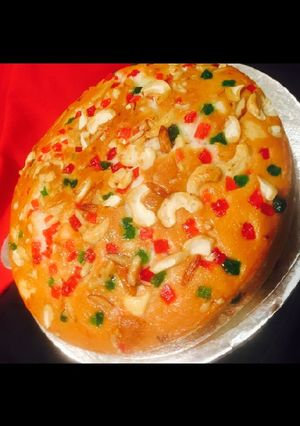 A picture of Orange dry fruits cake.
