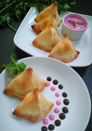 A picture of Baked Samosa with Beetroot yoghurt dip.