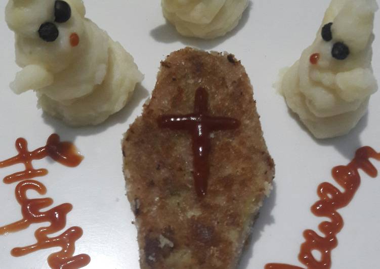 Mashed potato ghosts and veg cutlet coffin