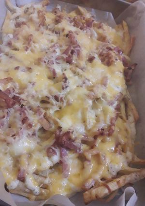 Una foto de Bacon & Cheese Fríes🍟🥓🧀