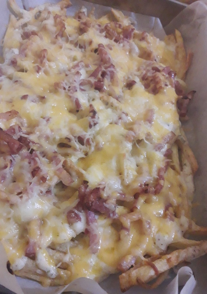Una foto de Bacon & Cheese Fríes🍟🥓🧀
