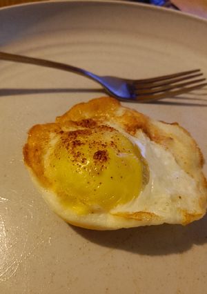 A picture of Air Fryer Baked Sunnyside Up Egg.