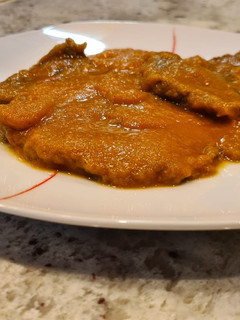 Una foto de Filetes de ternera en salsa de zanahoria y cebolla