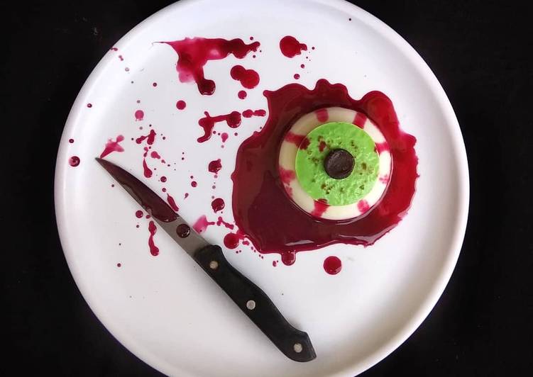 Halloween Bloody Eye Representing Coconut Milk and Banana Pudding with twist of Beetroot Sauce