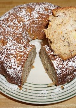 A picture of Banana Bread with Apples, Raisins, and Walnuts.