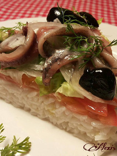 Una foto de Timbal de arroz jazmín, con anchas caseras