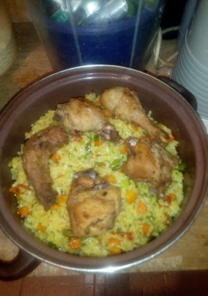 A picture of Fried rice and Chicken.
