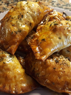 Una foto de Empanadillas de pavo, queso azul y espinacas