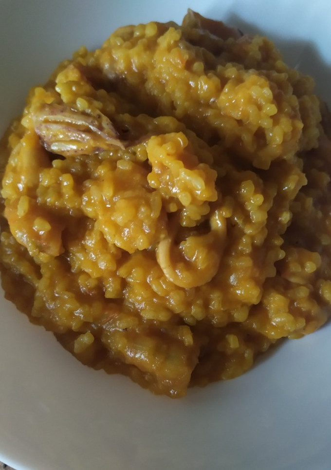 Una foto de Arroz caldoso de pescado en Mambo