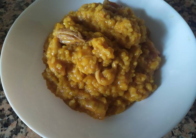 Arroz caldoso de pescado en Mambo