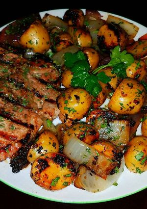 A picture of Mike's Grilled Pork Chops & Baby Golden Russets.