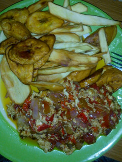 A picture of Fried chips and omelette..