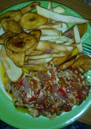 A picture of Fried chips and omelette..