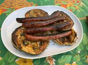 Une photo de merguez grillées