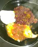 Huevos estrellados en salsa