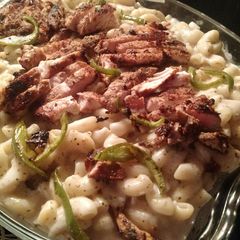 White sauce pasta with grilled chicken A picture of White sauce pasta with grilled chicken.