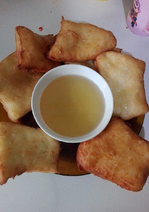 Una foto de Tortas fritas con almíbar