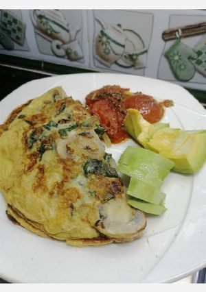 Una foto de Omelette de espinaca y champiñones 🍳🥚🥬