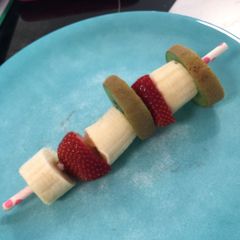 A picture of Fruit kabobs.