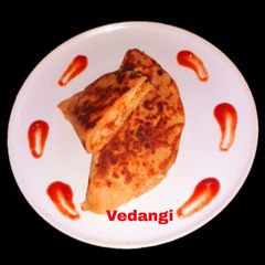 A picture of Cheesy Potato Roti Pocket.
