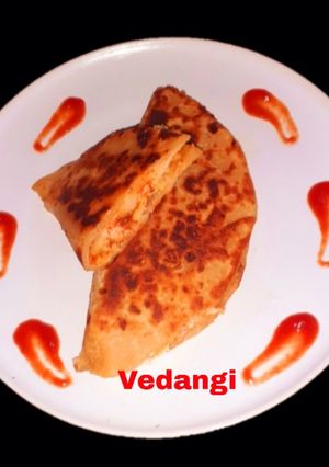 A picture of Cheesy Potato Roti Pocket.