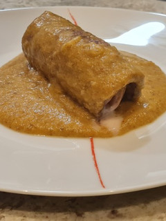 Una foto de Rollitos de ternera en salsa cremosa calabaza y champiñones