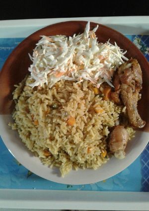 A picture of Fried rice with chicken.