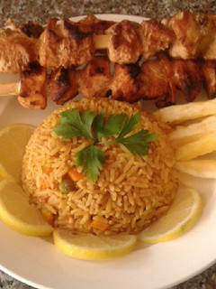 A picture of Rice with Shish Tawook - Delicious 😍😋.