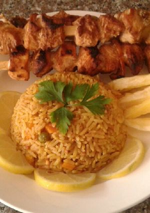 A picture of Rice with Shish Tawook - Delicious 😍😋.